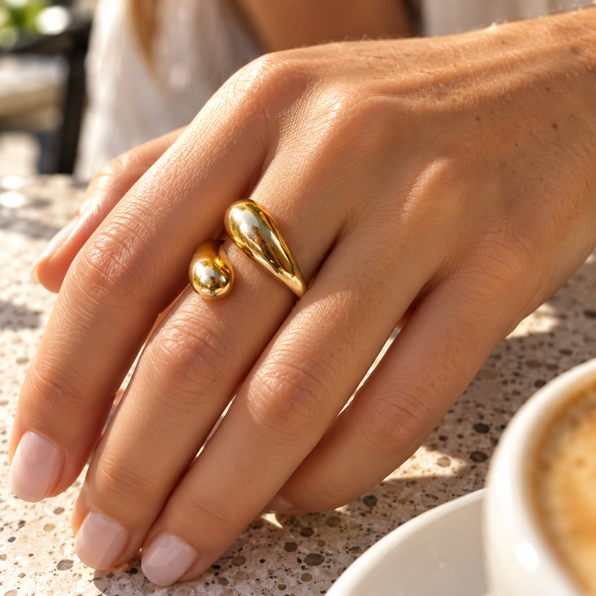 Woman wearing Open Waterdrop Ring
